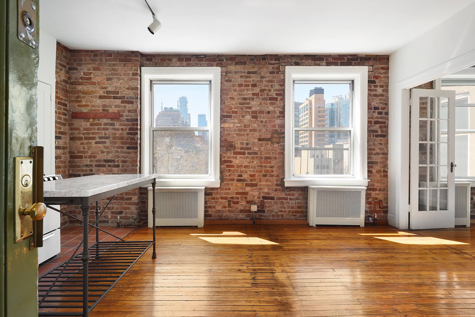 CONTRACTS OUT The quintessential New York home with open south facing views of lower Manhattan.