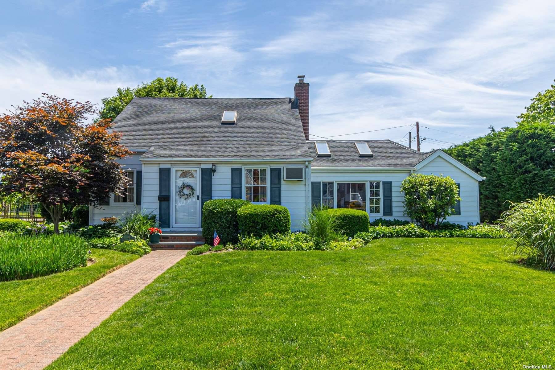 Meticulously maintained 4 bedroom 2 bathroom Cape located on a quiet and serene block in the Village of East Rockaway and in the award winning Lynbrook school district !