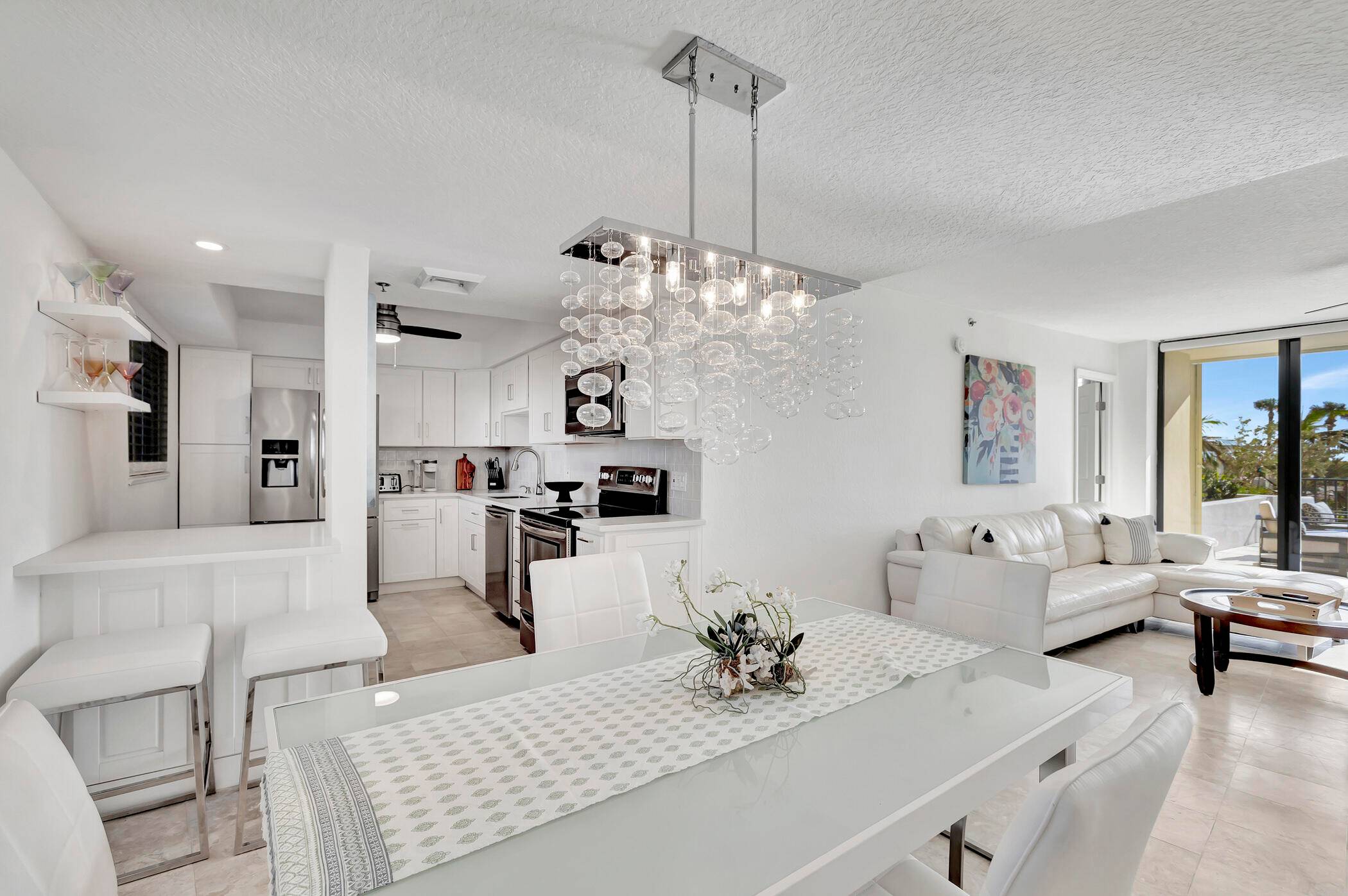 Experience the epitome of beachfront living in this beautifully renovated terrace level condo in the prestigious Ocean Trail.