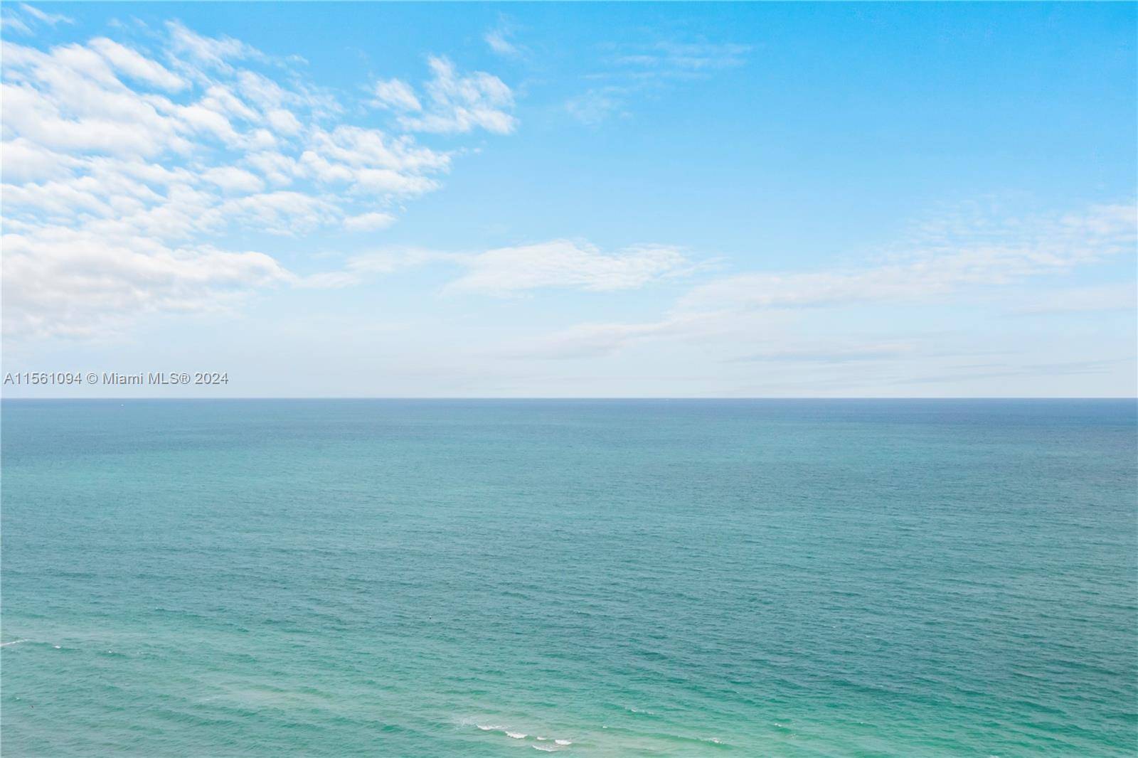 Recently remodeled high floor unit, offering captivating views of the ocean, bay, and Miami's skyline through floor to ceiling glass that open to an oversized terrace.