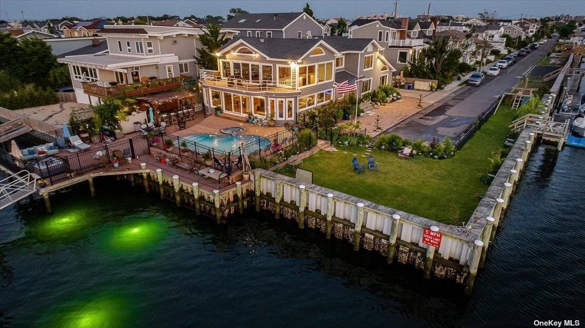 If Living On The Open Bay With The Most Impressive Piece Of Property In The Canals Section of Long Beach Is What You Have Been Dreaming Of, Then, No Need ...