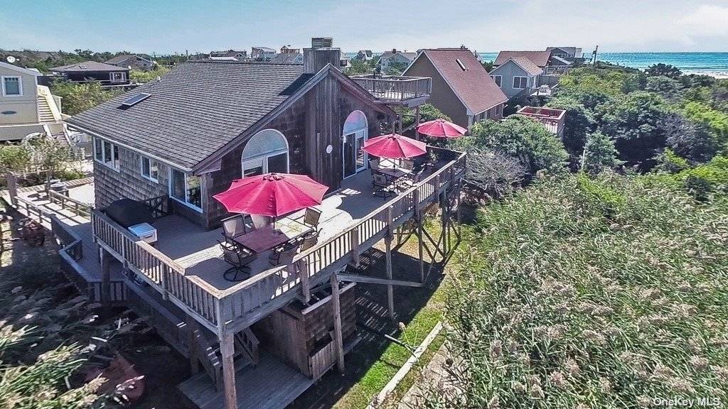 Truly an oasis, this stunning Atlantique home features views of the Bay with spectacular sunsets and a panoramic view of Fire Island.