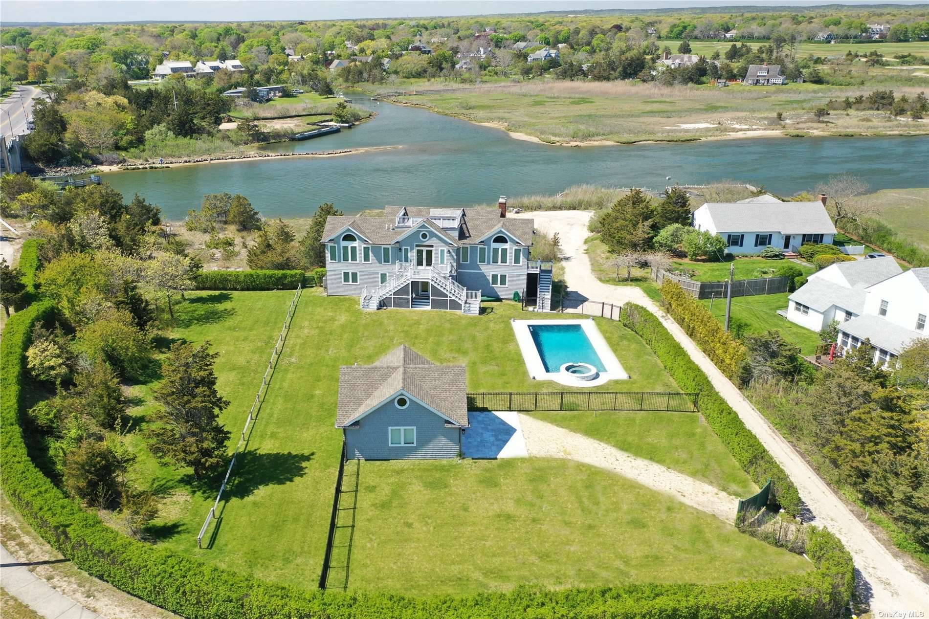 Views abound ! This stunning Quogue waterfront home, situated on an estate like full acre with 123 feet of waterfront, was meticulously reconstructed in 2017 to maximize views from indoors ...