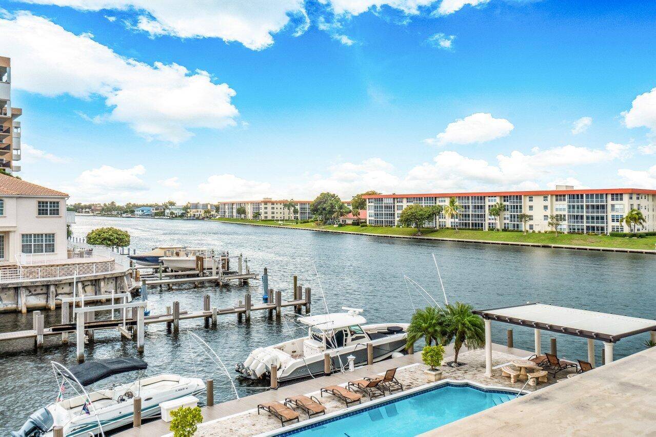 This waterfront escape is nestled on its own island in luxurious Hillsboro Beach aka Millionaire Mile.