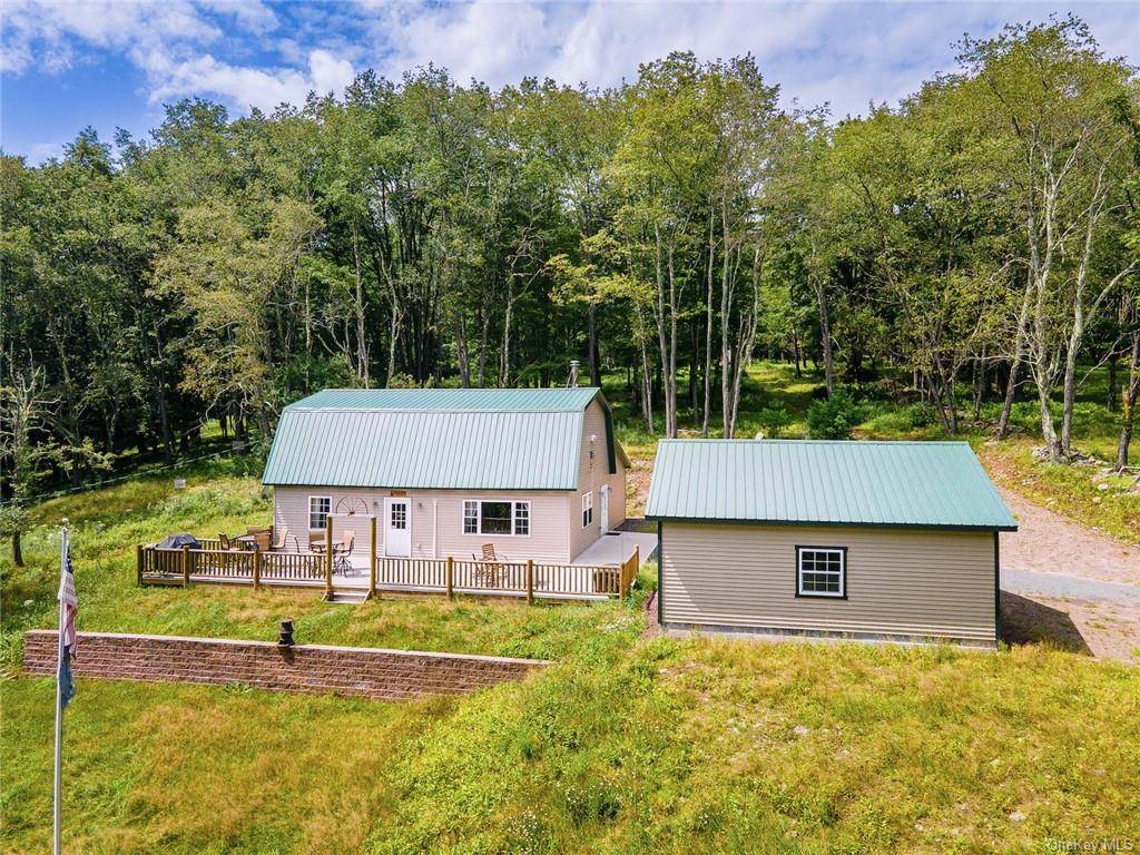 Escape the hustle and bustle of city life and embrace the tranquility of this remarkable 2 bedroom, 2 full bathroom house nestled on a sprawling 54 acre property in the ...