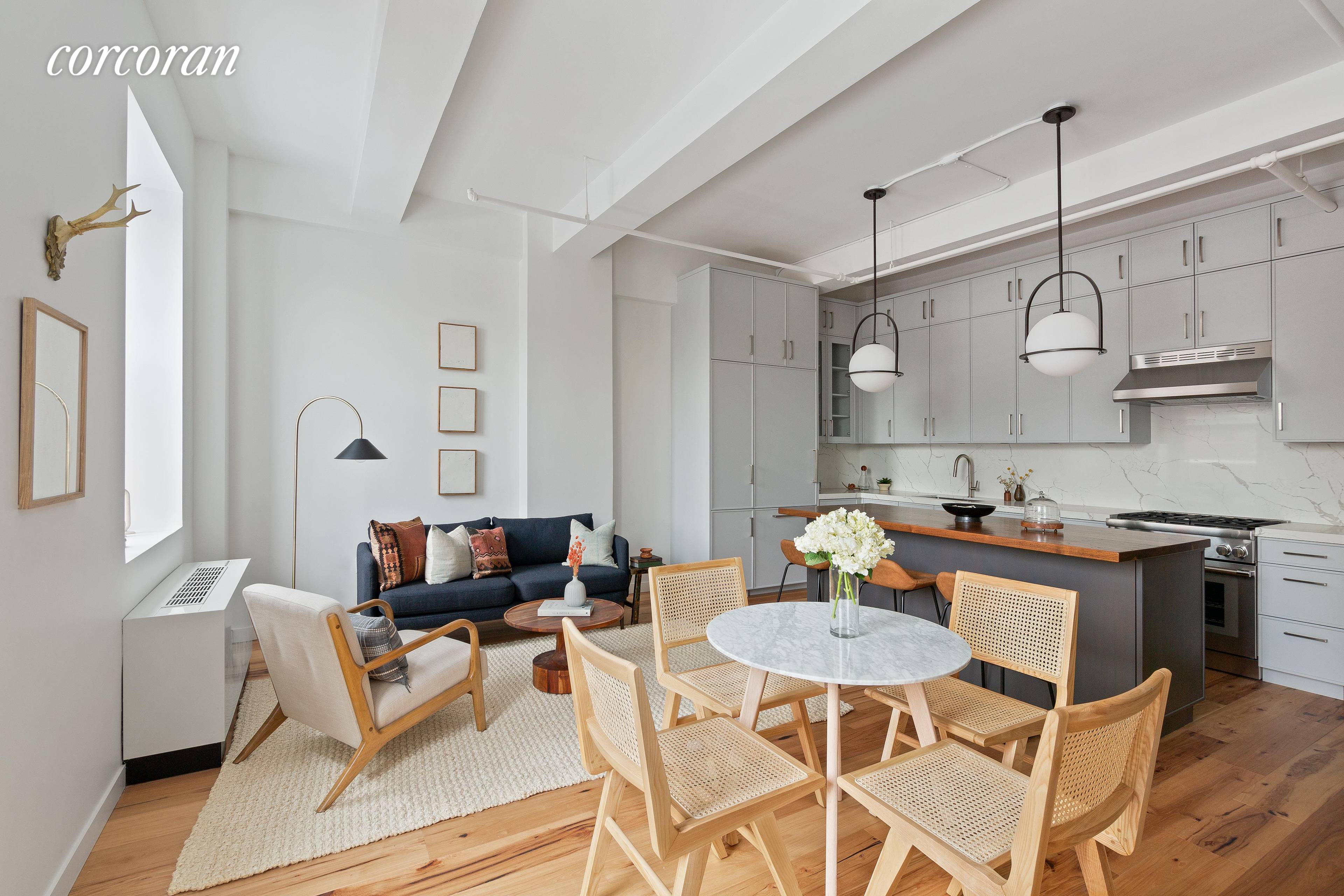 In Downtown Brooklyn's most iconic condominiums, this high floor two bedroom, two bathroom has spectacular views and a sizable terrace running the full width of the main living space.