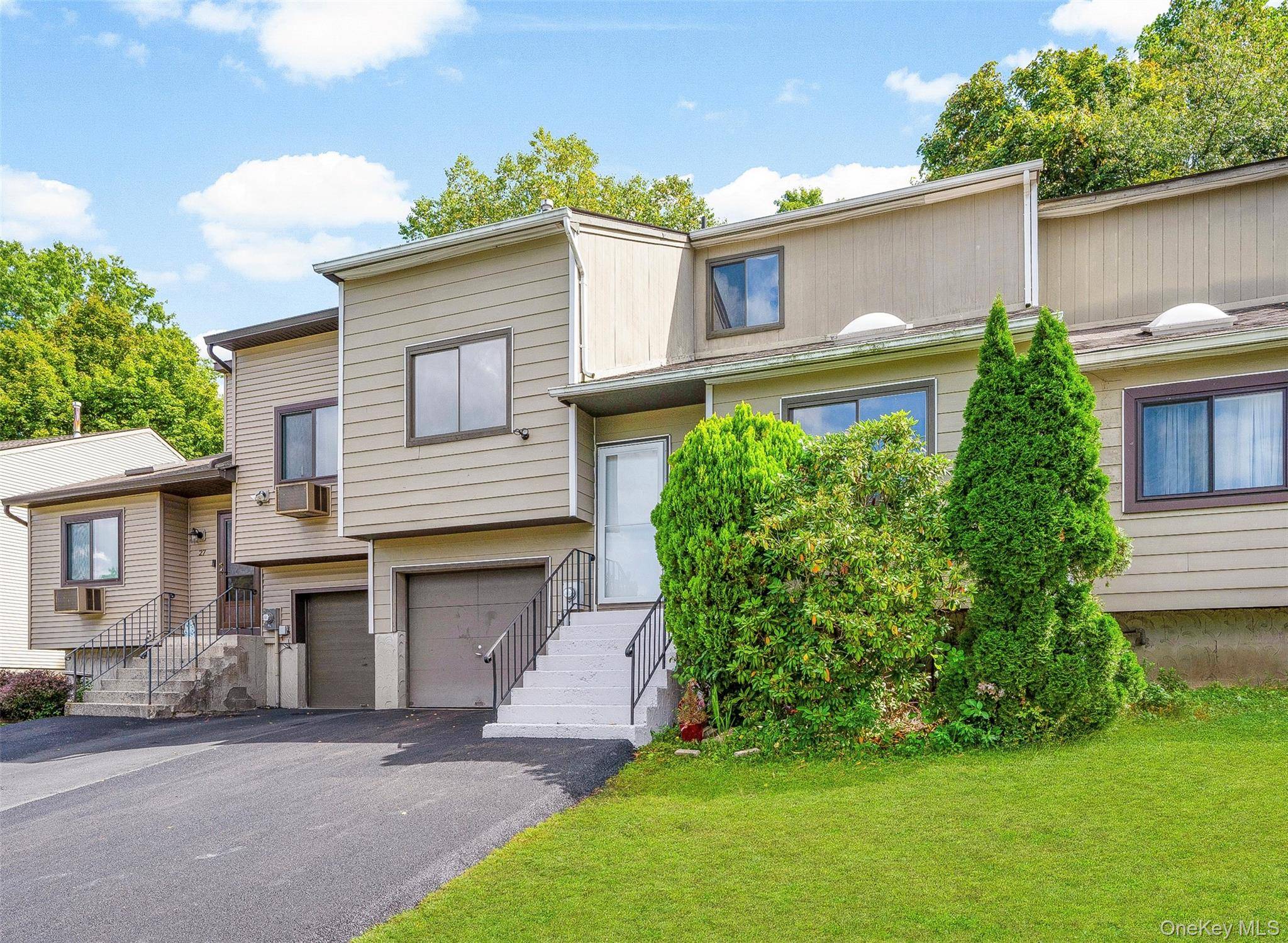 Completely renovated contemporary townhouse located on a quiet cul de sac in the sought after Round Hill community in the Town of Fishkill.