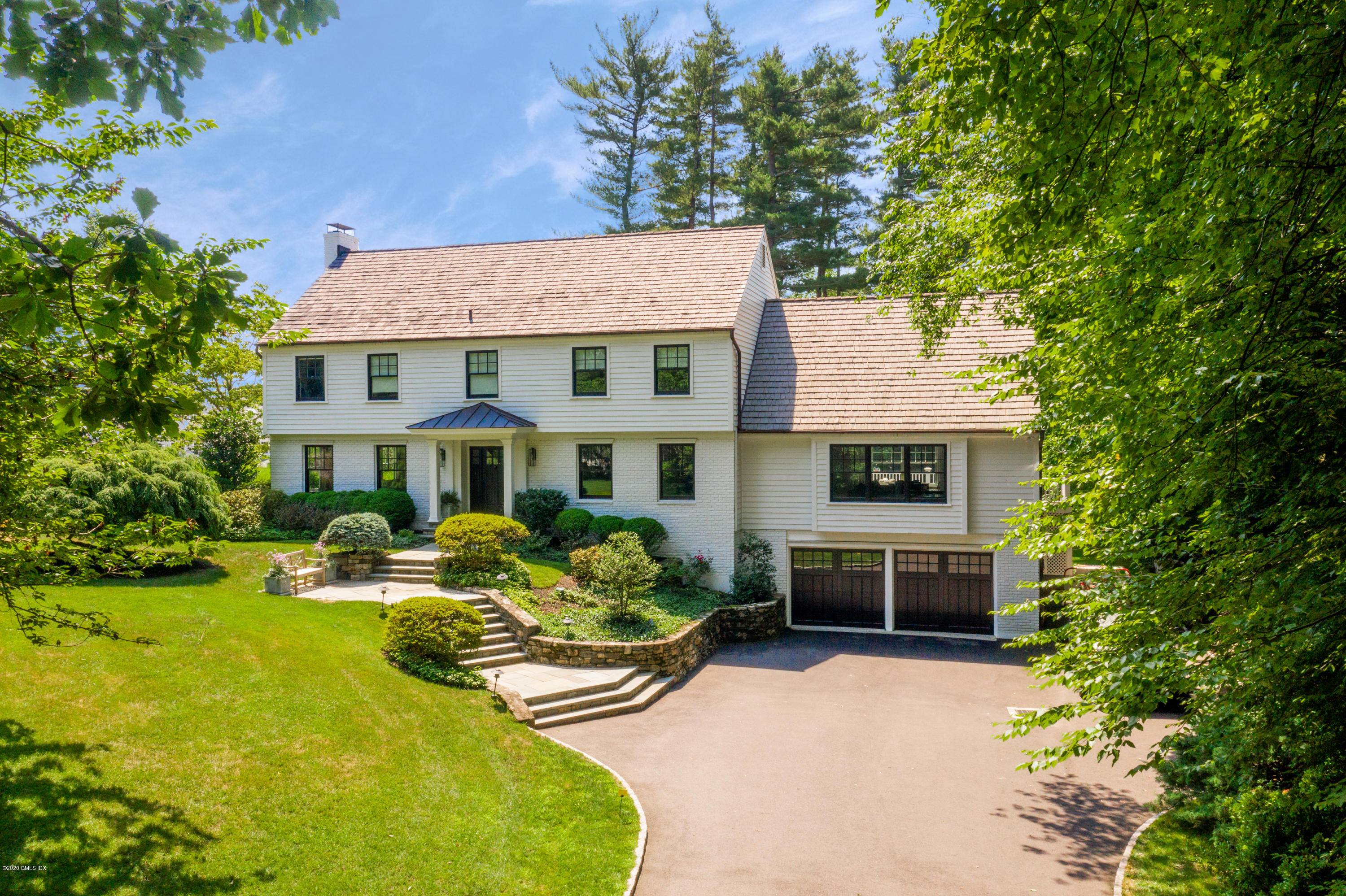 Beautifully set back off of Dingletown Road this private inviting five bedroom home with an idyllic backyard retreat nestled on 1.