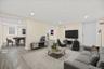 virtually staged main area of the basement