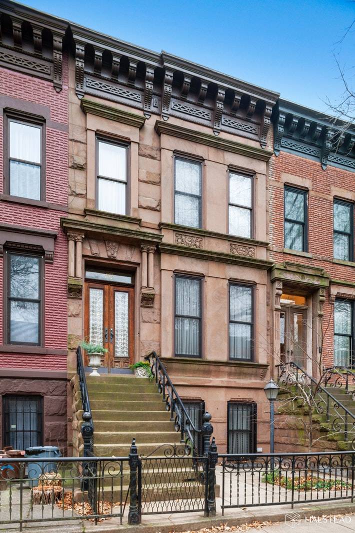 Coveted 14th St is home to this special, land marked park block classic brownstone.