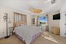 Primary Bedroom with Direct access to the patio and pool