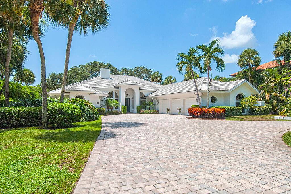 PRIVACY awaits at this luxury waterfront estate in Riomar Bay II.