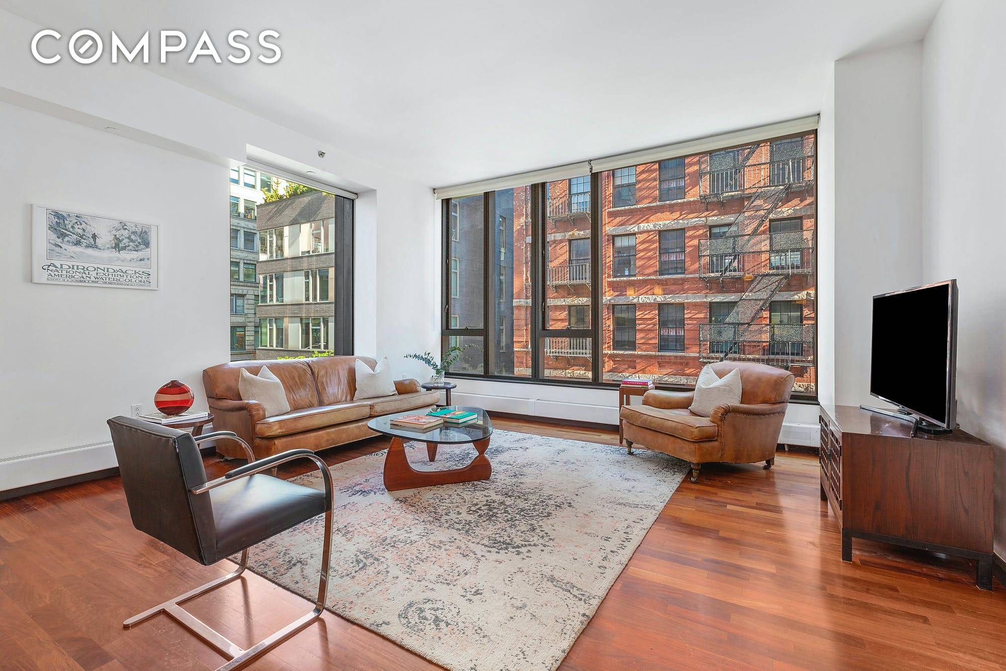 Motivated seller ! Apartment 4E is an inviting two bedroom condo with modern conveniences and low carrying costs in the heart of Hudson Square.