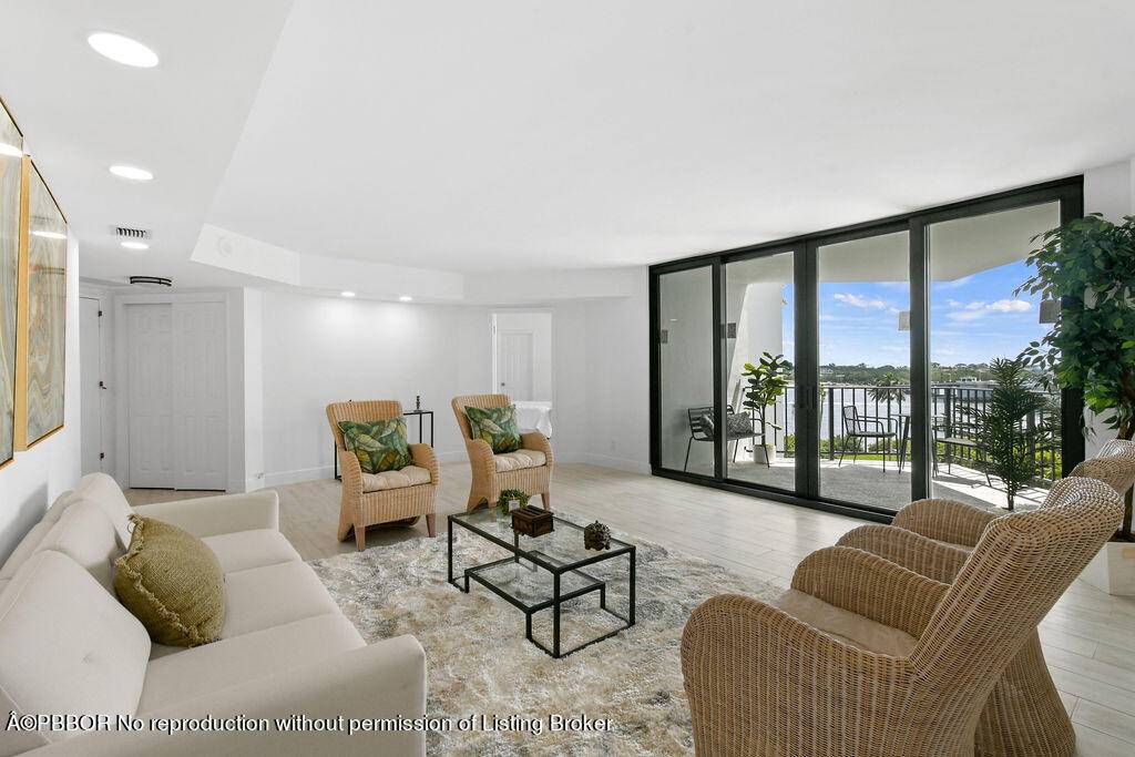 Completely turnkey condo with water views from every angle !