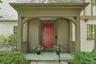 A close up of the stunning entry porch of this 1929 Tudor combining timeless architectural character with the state-of-the-art amenities and sophistic