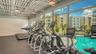 well equipped fitness center, and overlooks pool