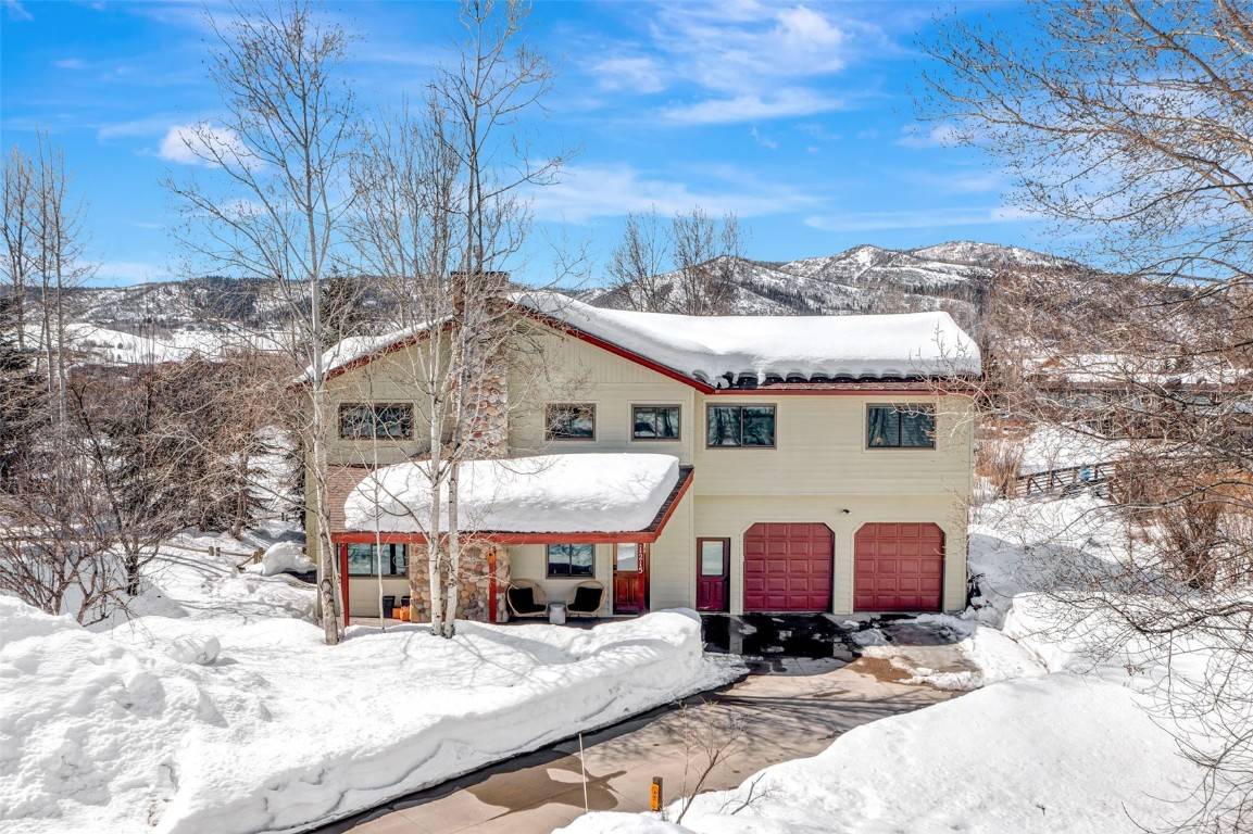 This exceptional home has been remodeled in a contemporary, mountain modern style with a new kitchen, fresh coat of paint throughout, new light fixtures from top to bottom, brand new ...