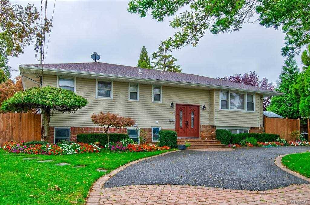 Beautiful Hi ranch good for extended families in Hicksville featuring 5 Bedrooms 3 bath, New roof, nice kitchen with granite island, Hard wood floors throughout, Brick patio, Beautiful landscaping, Inground ...