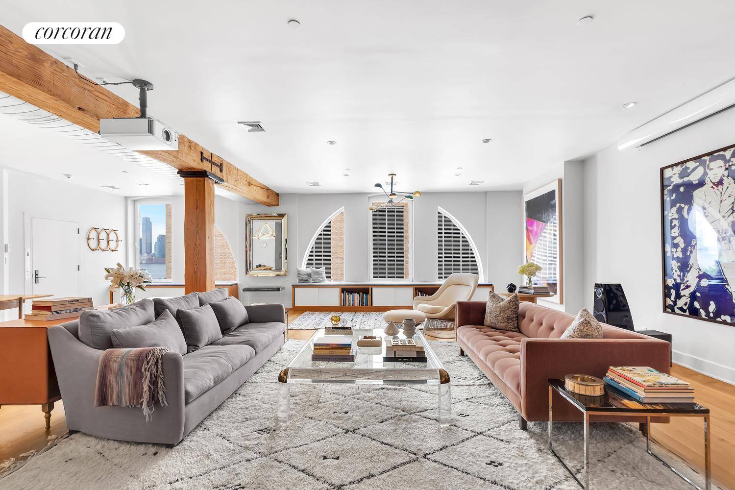 Modern luxury combines with pre war elements in this renovated authentic Hudson Square condominium loft that epitomizes the true essence of downtown living.