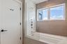 Bathroom with vanity and tub/shower