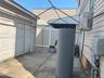 View of patio / terrace with a garage
