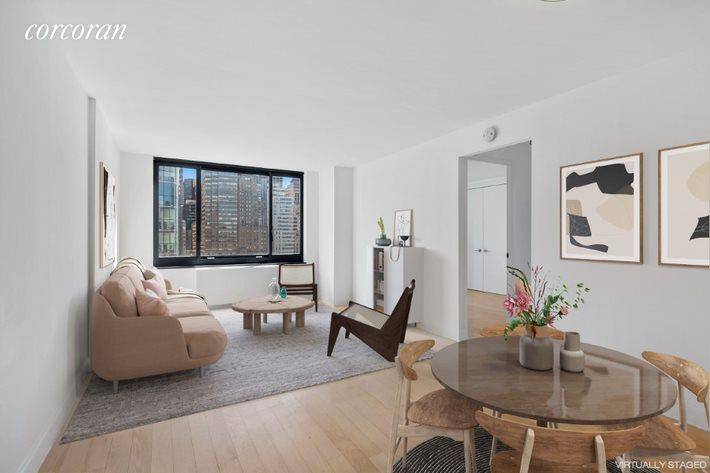 Luxury waterfront living in beautiful Battery Park City This recently gut renovated, southwest facing 2BR 2BA residence features a generously proportioned open concept living space and hardwood floors.