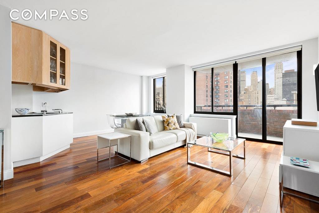 This sunny, move in ready two bedroom, two bathroom apartment at The L Isola Condominium in Murray Hill offers beautiful views of the Chrysler building from three exposures and a ...