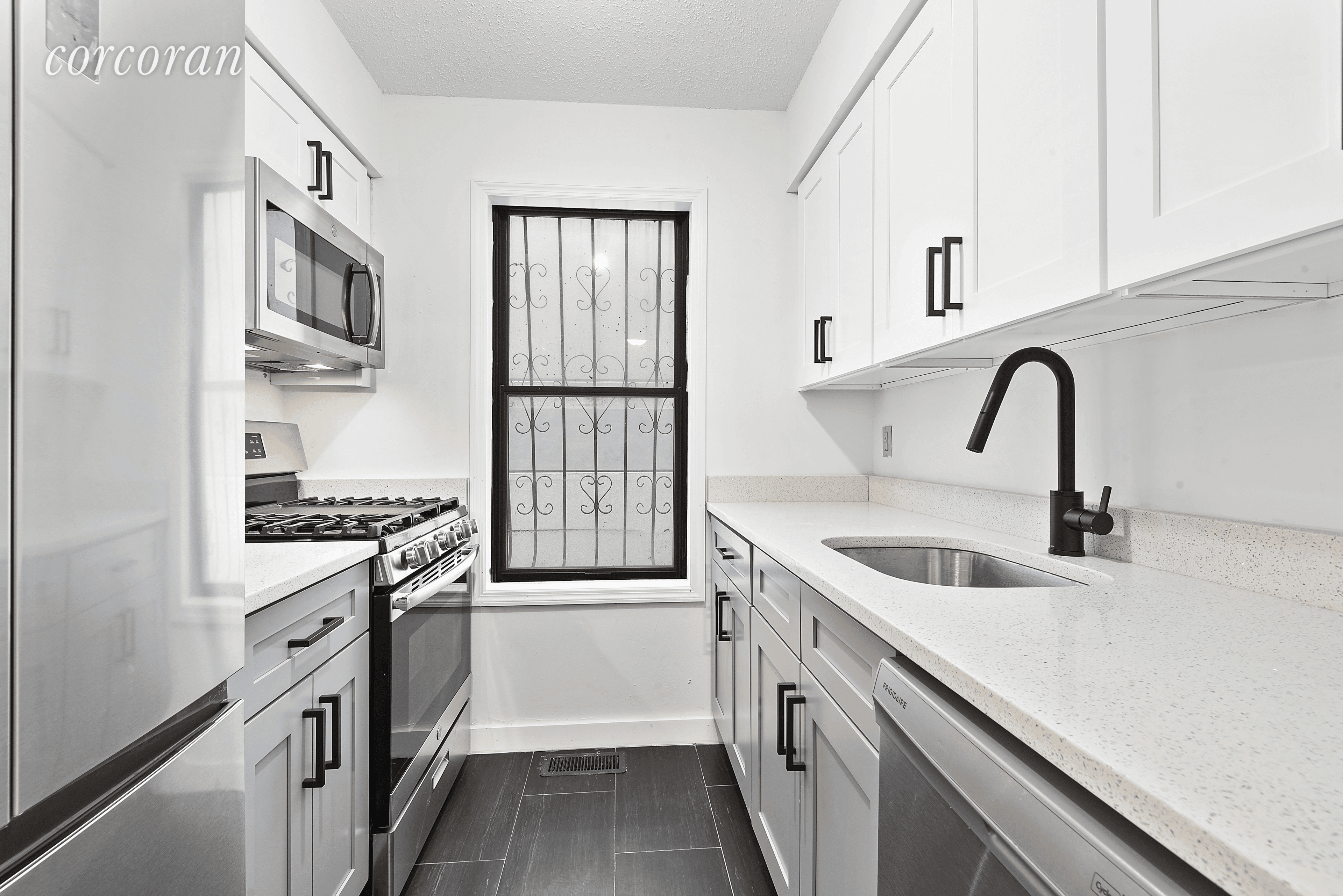 Welcome to 185 Tompkins Street, Apartment 1, a newly renovated, enormous two bedroom duplex with private parking in the heart of Bed Stuy.