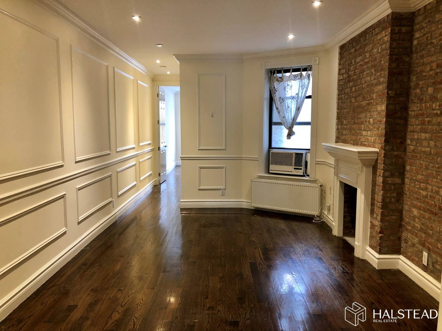 Live in this mint Brownstone 2 Bedroom 1 Bath home which has been beautifully restored with crown moldings, walnut wood floors, exposed brick, open kitchen with granite counter tops, white ...