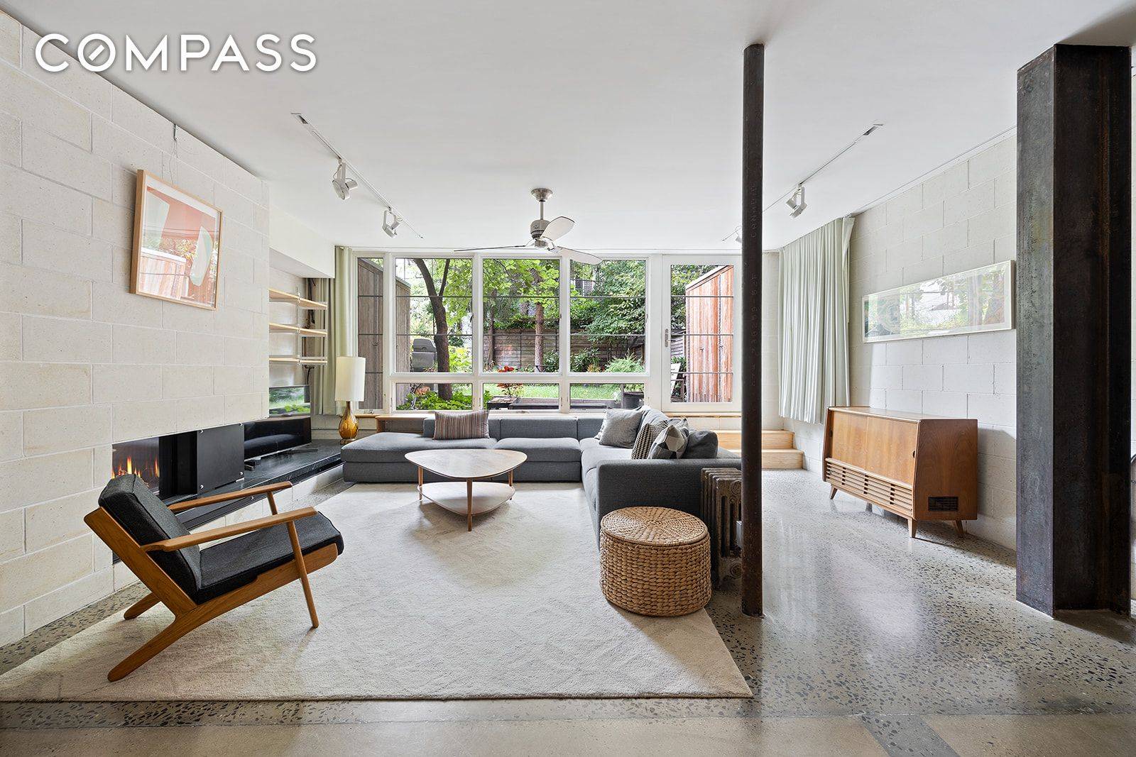 Chic loft living meets private outdoor space in this sprawling three bedroom, two bathroom garden duplex with an expansive, landscaped backyard in the perfect Greenpoint location.