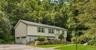 A Warm and inviting Raised Ranch with 3 Bedrooms and 3 Baths