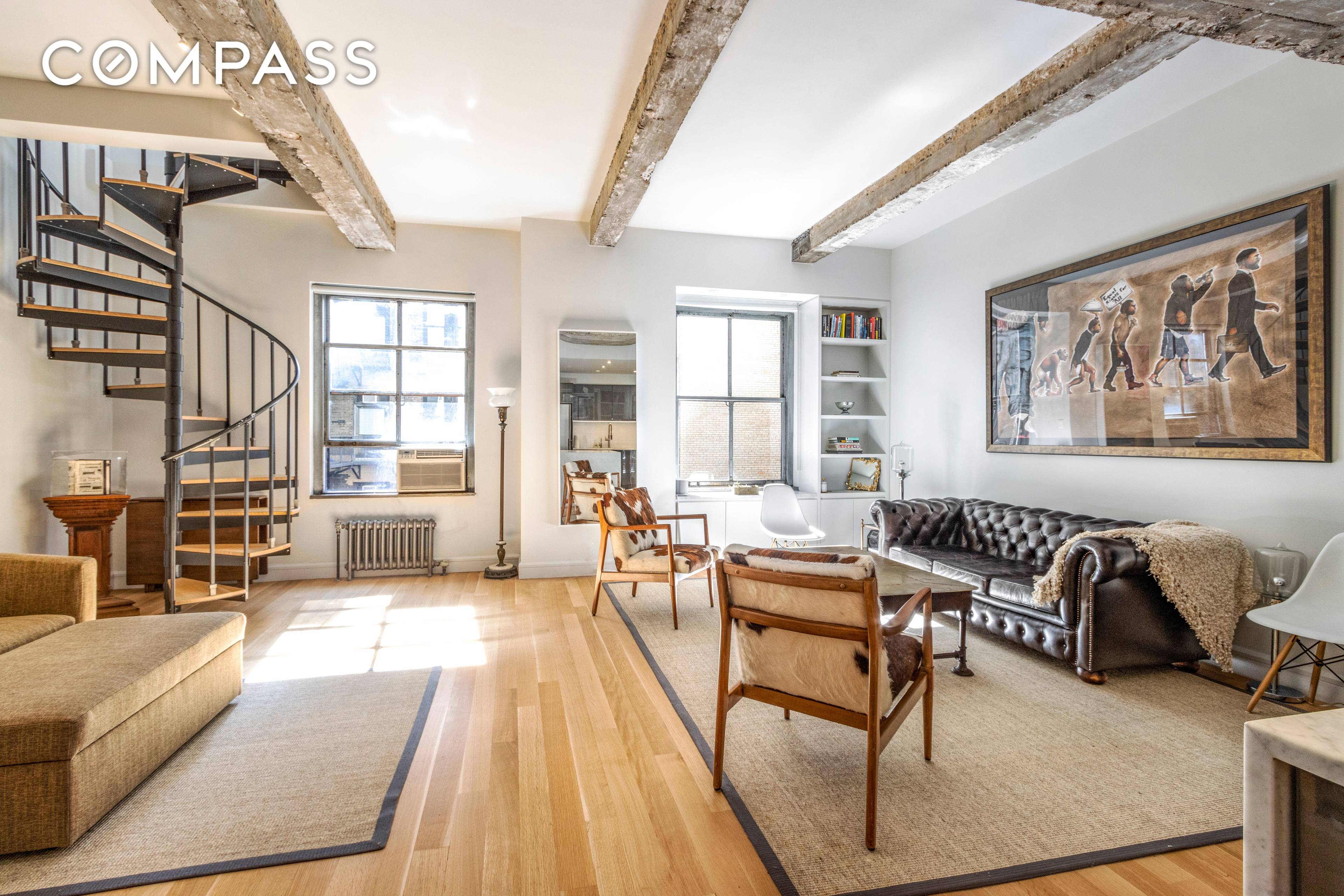 Welcome home to this exquisitely renovated duplex loft at the Sage House.