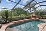 Custom pool and spa with rock waterfall feature.
