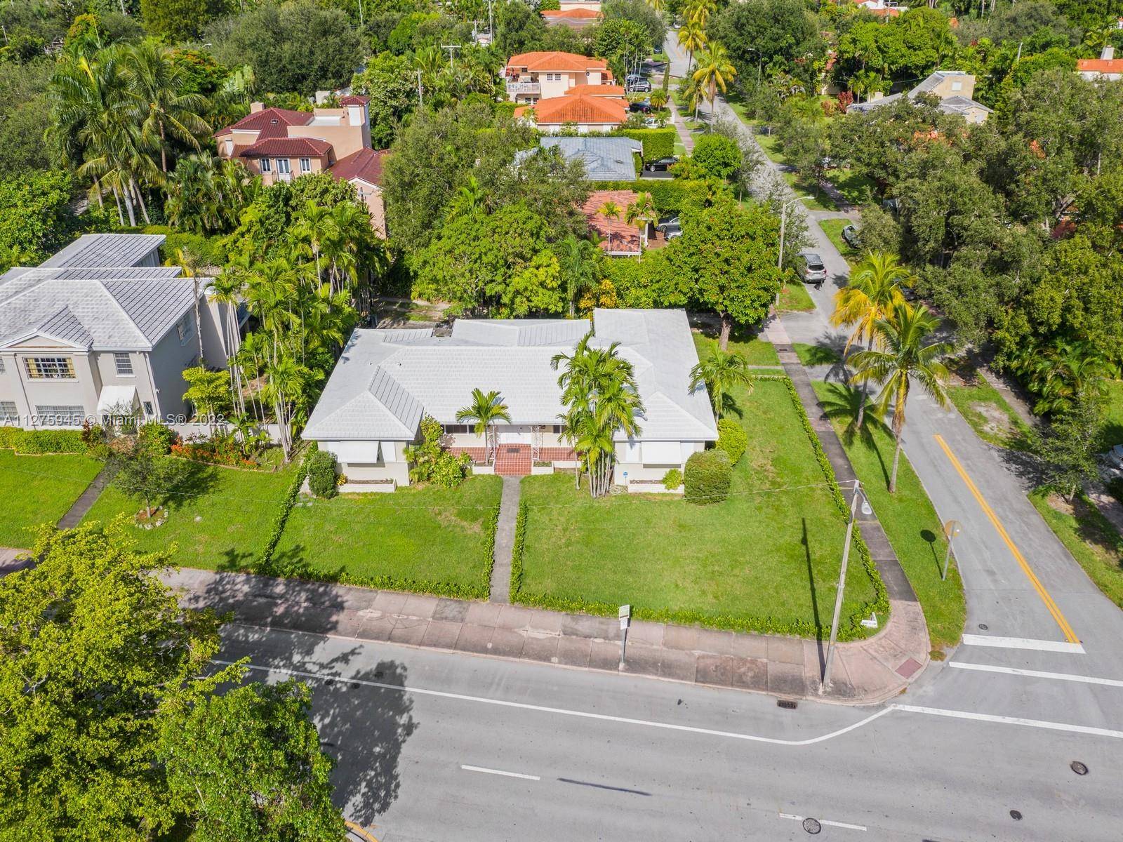 Beautiful corner duplex, on Ponce and Carina, within walking distance to both Merrick Park and Miracle Mile, and a few steps away from the Coral Gables trolley for easy access ...