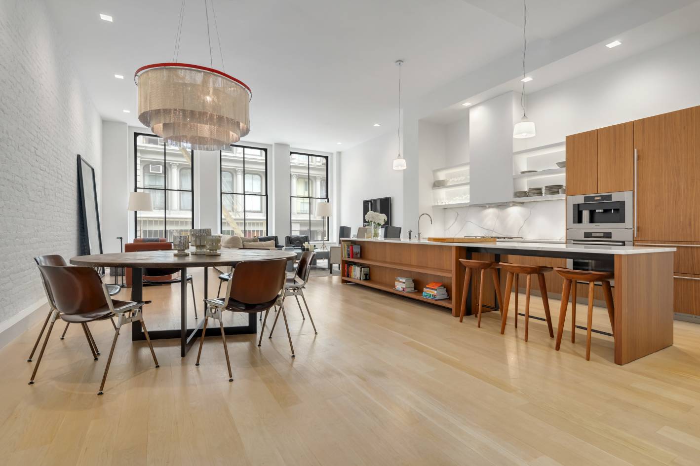 This mint and magnificent full floor loft is offered FULLY FURNISHED and is located on one of SoHo s most vibrant blocks.