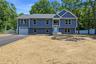 Brand new Raised Ranch just under 3,000 square feet of beautifully designed living space, set on a spacious half-acre lot on a newly developed road.