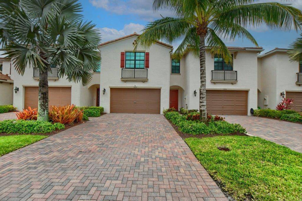 PRICED REDUCED ! Live the resort lifestyle with amenities in The Enclave of Boca Dunes a gated community.