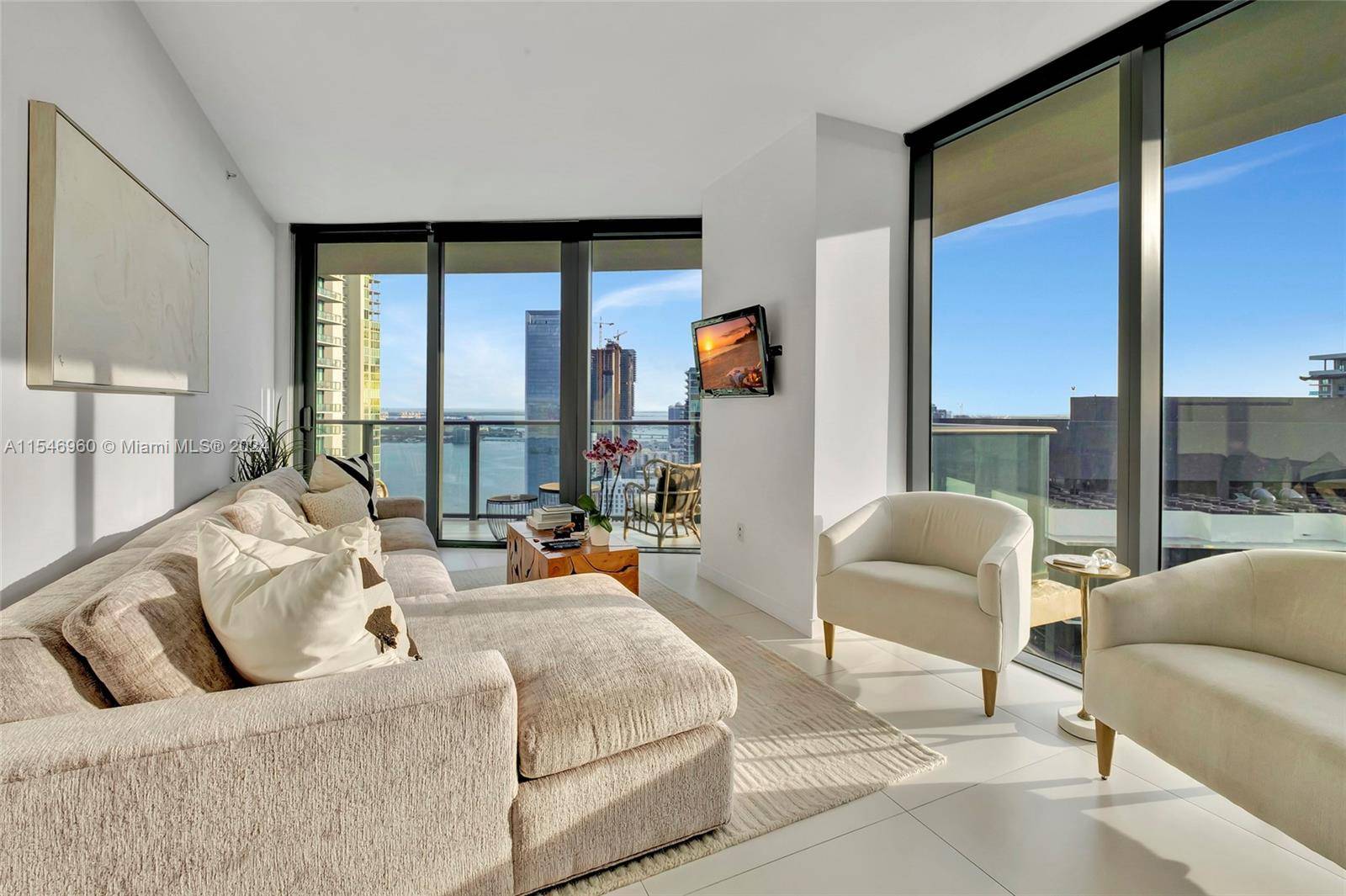 Welcome to your luxurious slice of paradise in the prestigious Edgewater neighborhood, where urban sophistication meets serene waterfront living.