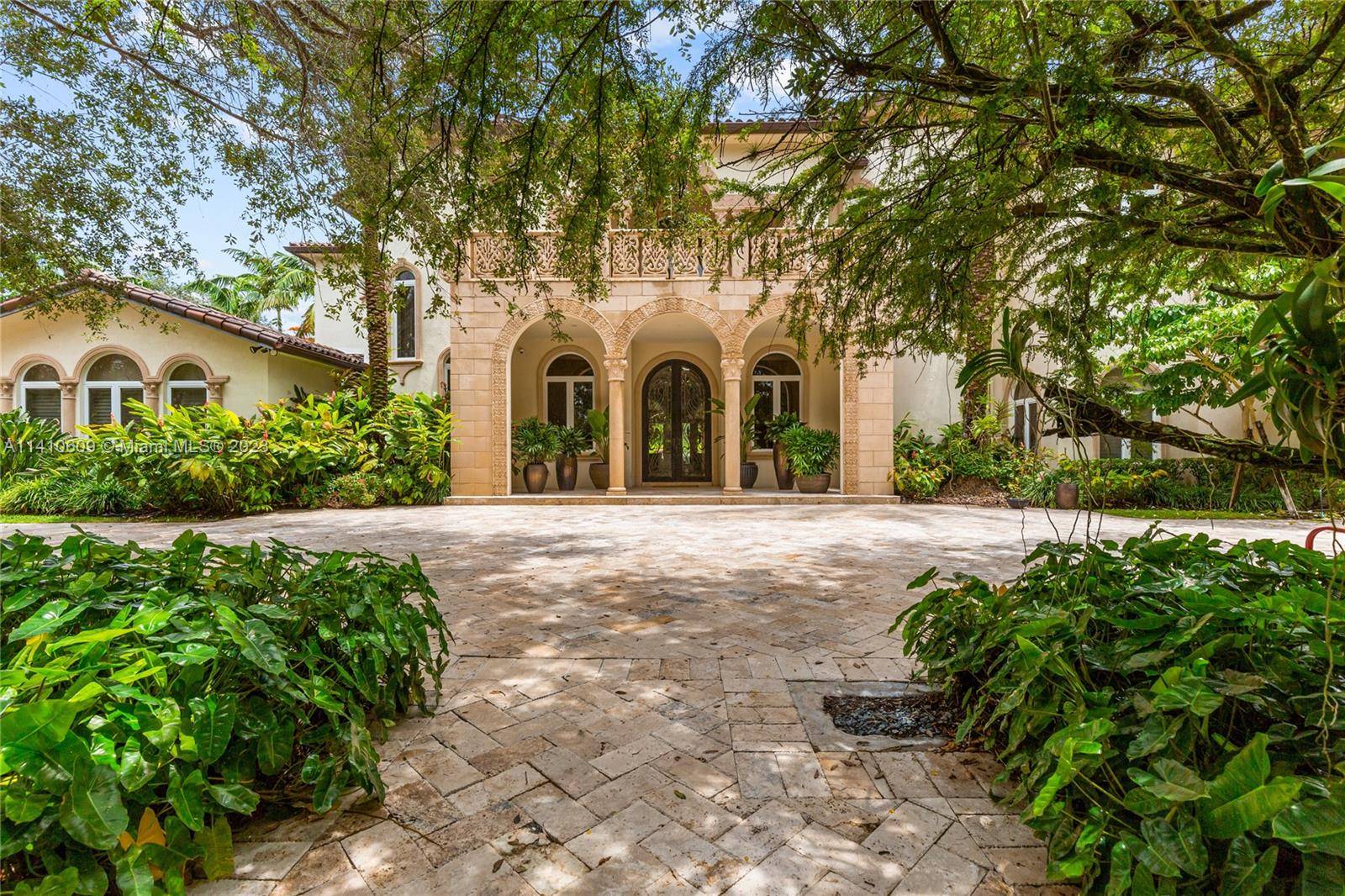 Discover the epitome of opulence with this breathtaking, private, custom built Mediterranean single family home, nestled on a sprawling acre estate.