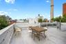 View of patio / terrace featuring a skyline view and outdoor dining space