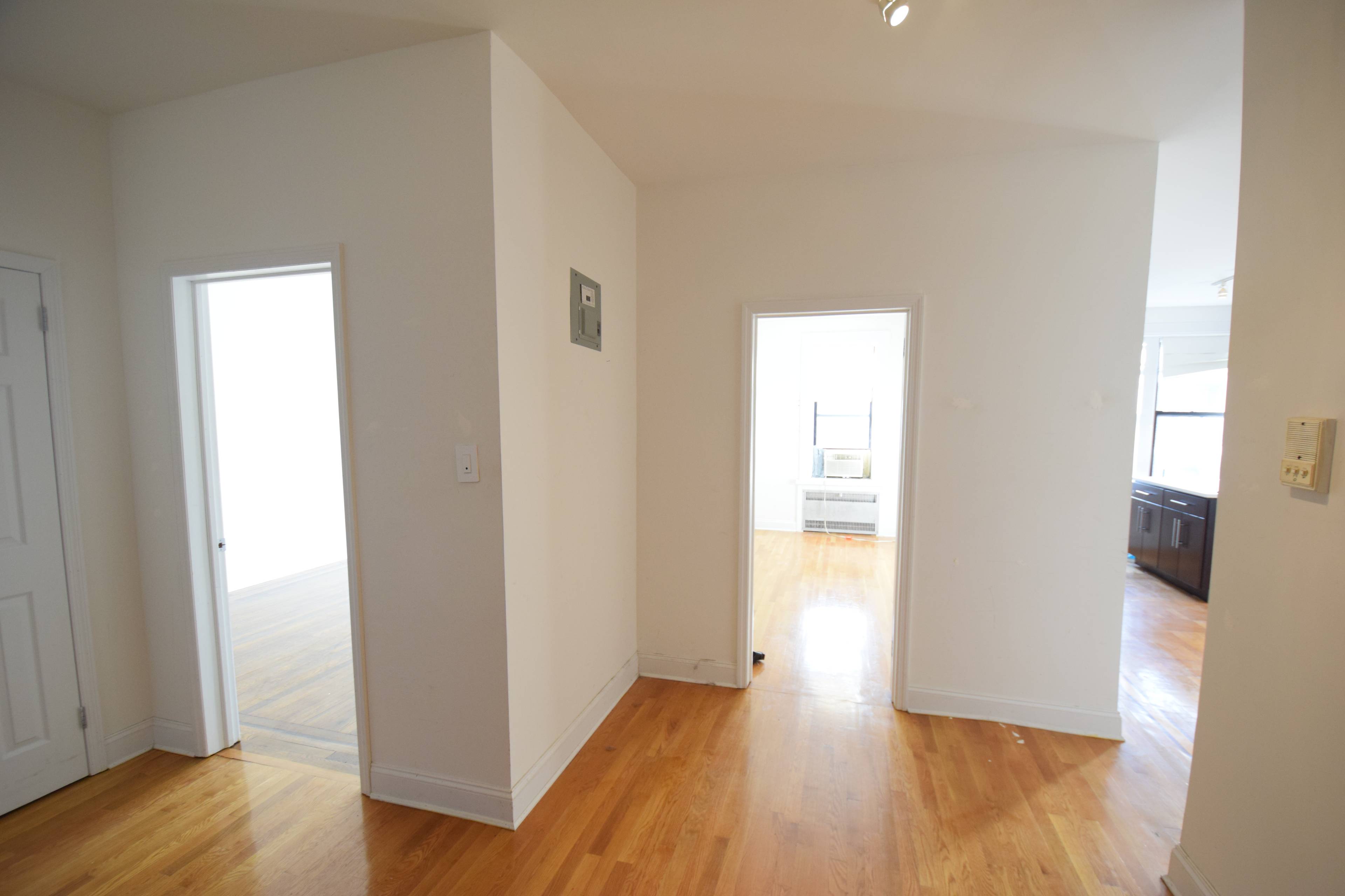 This apartment is located on the 6th floor of a building with an elevator and a live in super.