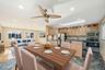 Dining room with plenty of natural light, a skylight, a ceiling fan, and recessed lighting