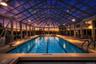 Glass enclosure for heated indoor pool.