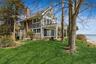 house and bayfront lawn