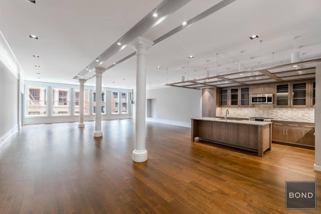 Live in a stunning true 3000 sq ft loft in the center of artistic Soho.