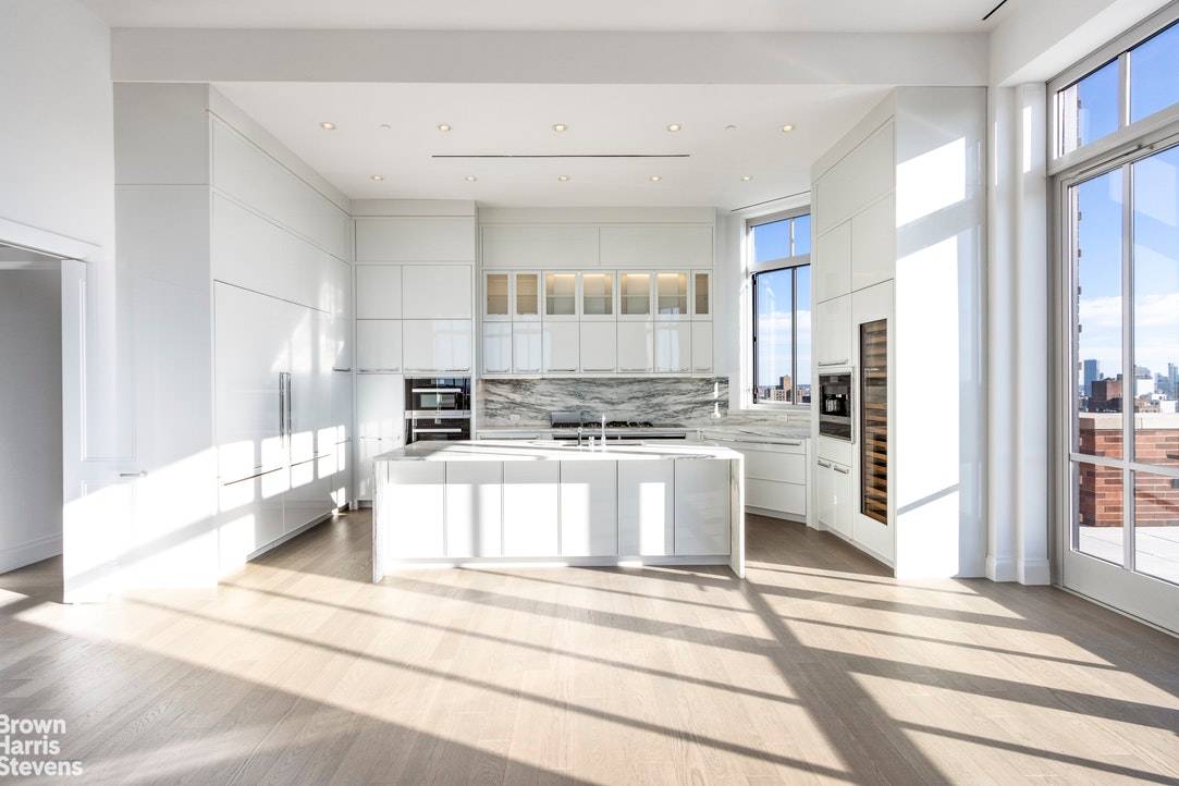 A brand new, never been lived in triple mint trophy penthouse with massive entertaining terrace space, majestically suspended high above the cityscape of the Upper East Side with dramatic birds ...