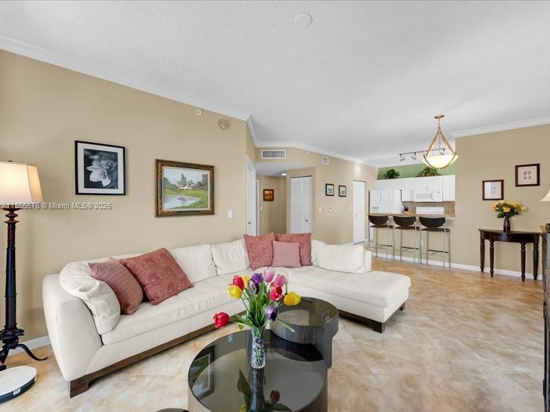 Spacious Living- and Dining Room with Open Kitchen. Ideal to relax or host friends and family.
651 Okeechobee Blvd., Unit #1002, West Palm Beach, FL.