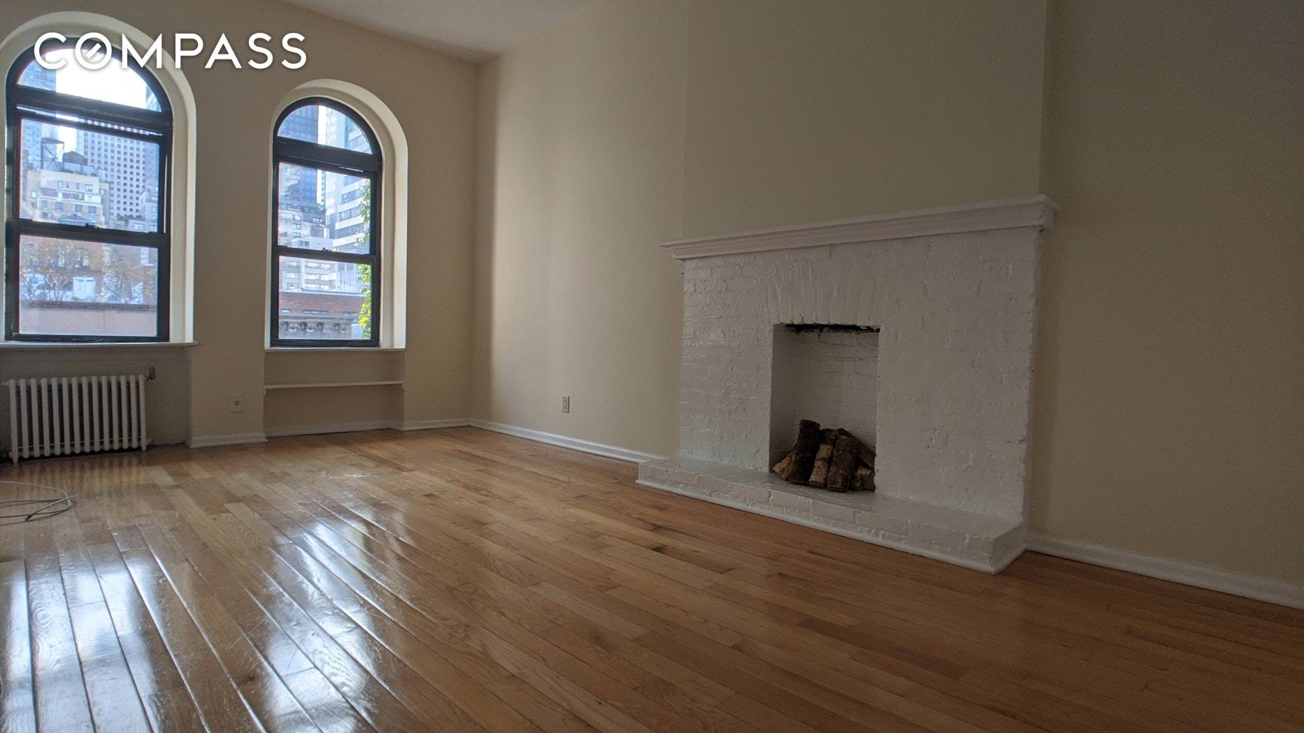 E 60s amp ; Third Ave Large Sun Flooded 1BR with Soaring Ceilings, Exposed Brick, Fireplace, Southern Exposure, Kitchen with Pantry and M W, Tons of Closet Space, and Sprawling ...