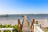 A 400-foot private dock leads you across the Manatee River, offering breathtaking views from this magnificent estate.