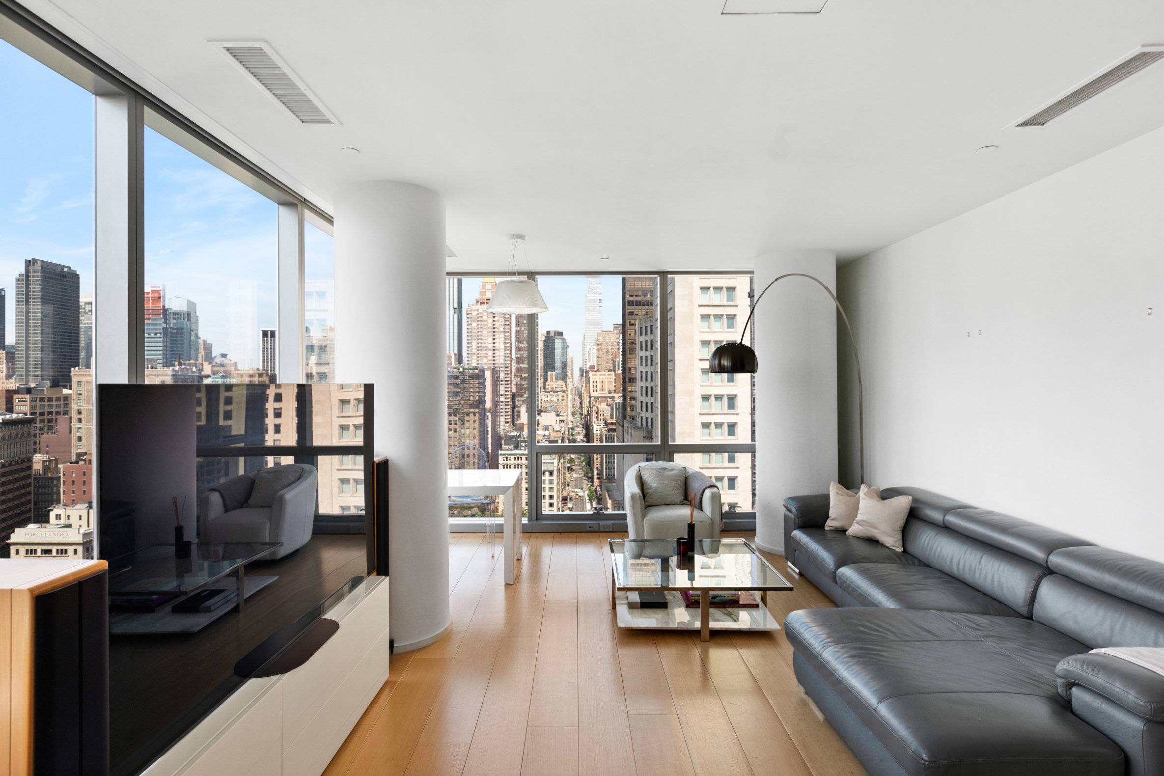 Enjoy sweeping Manhattan views out every window of this stunning two bedroom, two bathroom home in the illustrious One Madison condominium, positioned at the foot of Madison Square Park.